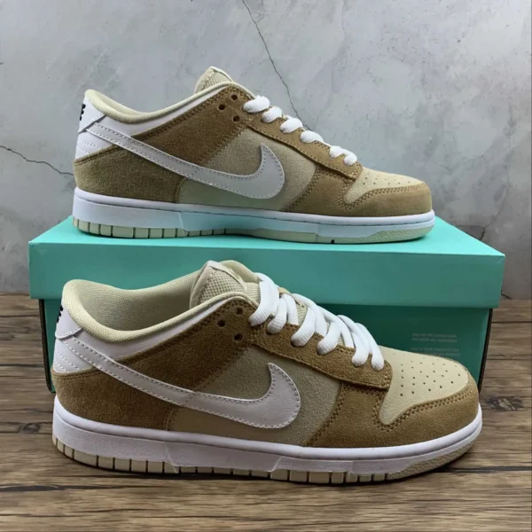 SB-Dunk-White-_-Medium-Curry-1.webp SB Dunk White and Medium Curry